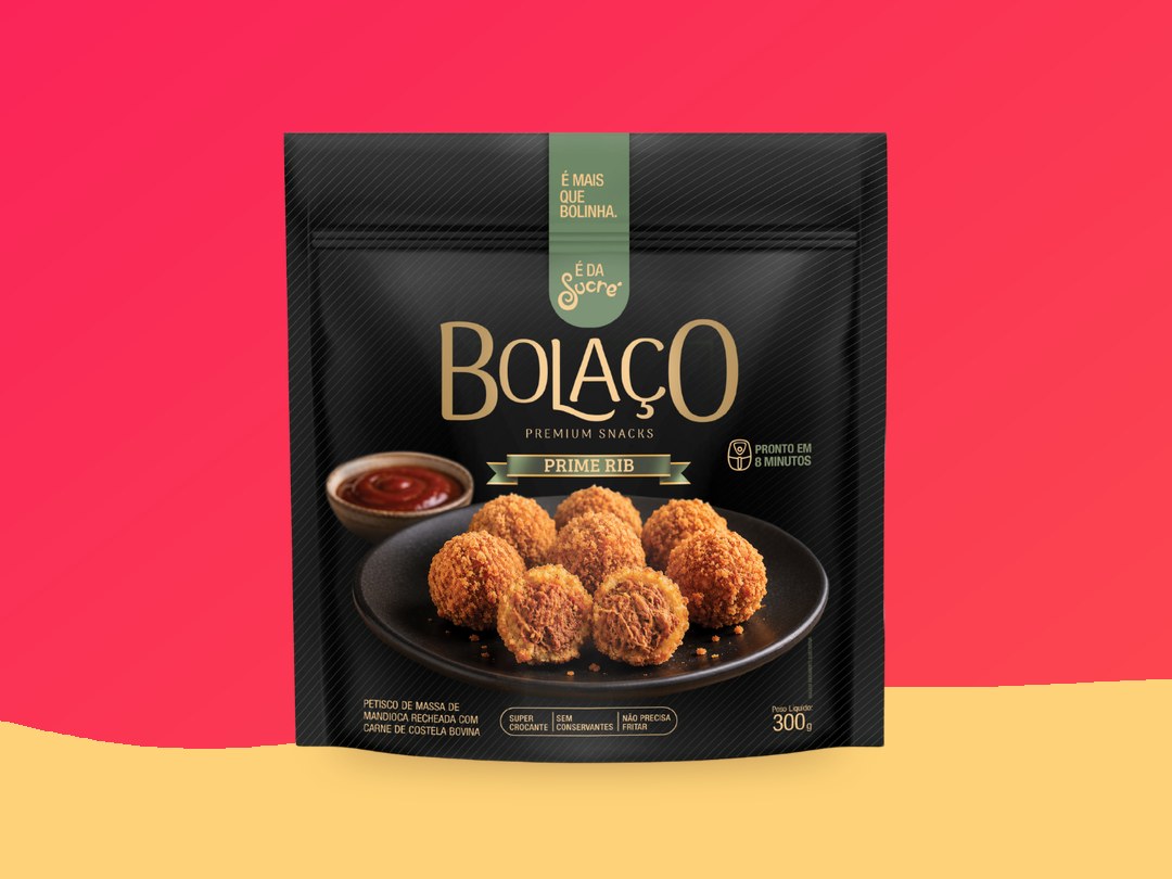 Embalagem premium do Bolaço Prime Rib sobre o degradê rosa da marca